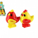 Poussin sauteur à remontoir en plastique 7 × 9 cm, 2 couleurs