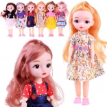 Poupée mignonne avec membres articulés et cheveux longs 24 cm