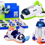 Petite fusée spatiale avec cockpit mobile vert et orange