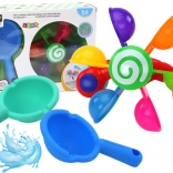 Jouet de bain rotatif avec bols colorés et deux cuillères