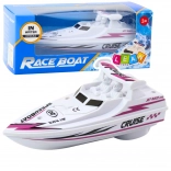 Bateau à moteur blanc à piles