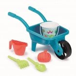 Brouette de jardin avec arrosoir et seau