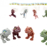 Pendentif dinosaure avec membres articulés