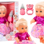 Poupée en robe rose avec biberon et hochet, avec sons et fonction pipi