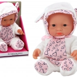 Petite poupée bébé en tenue blanche avec capuche et oreilles