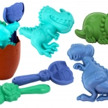 Set de sable dinosaures avec seau en forme d’œuf, pelle, râteau et moules