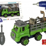 Camion de transport avec dinosaures