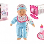 Poupée avec berceau et sucette