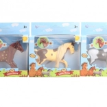 Petit cheval en plastique en boîte