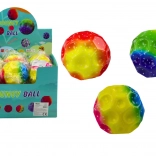 Balle lumineuse à malaxer avec alvéoles 9,5 cm colorée