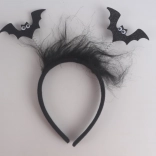 Serre-tête avec chauves-souris et plumes