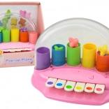 Petit piano interactif rose avec étoiles filantes